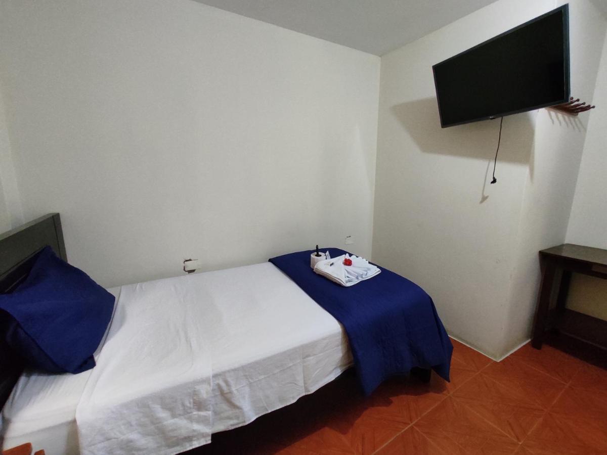 Hotel Nuevo Amanecer ปวยร์โต จิกามา ภายนอก รูปภาพ