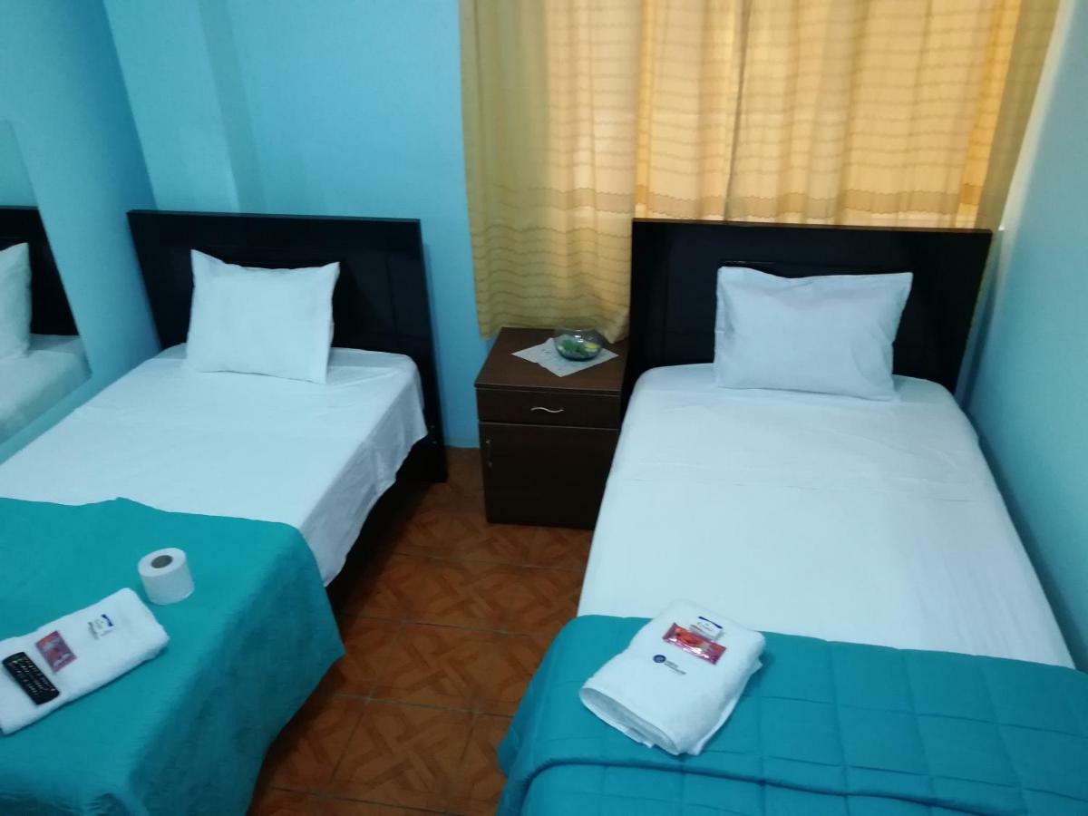 Hotel Nuevo Amanecer ปวยร์โต จิกามา ภายนอก รูปภาพ